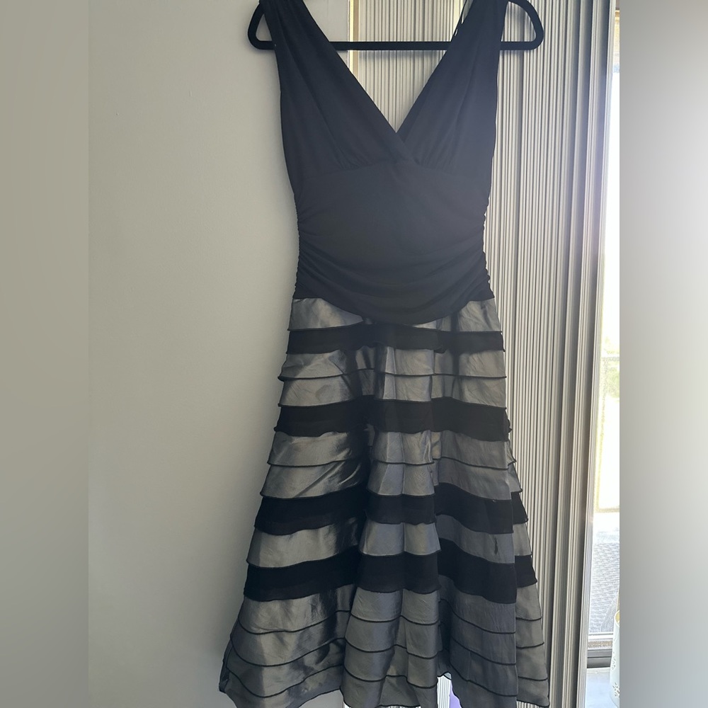 Beautiful black and silver dress. V neck back and front